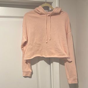 Cropped pink hooded sweatshirt